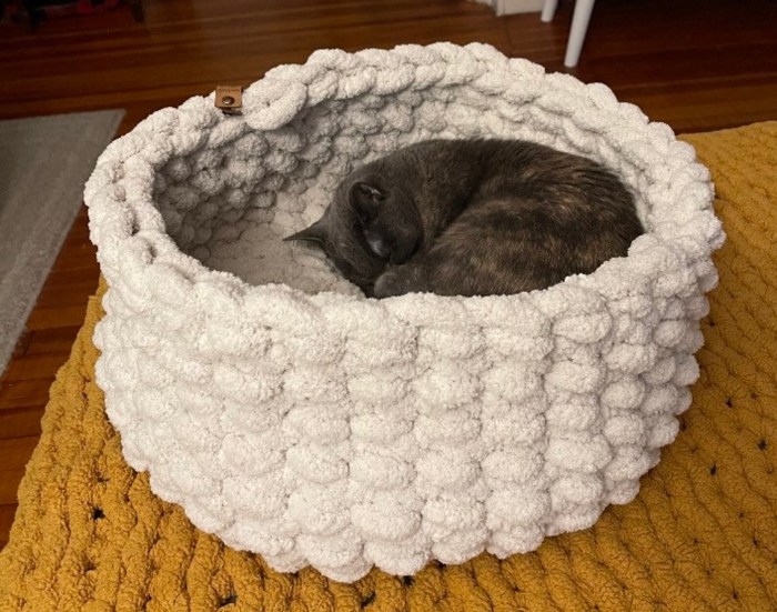 Hand-stitched velvet pet bed